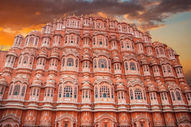 The pink honeycomb facade of Hawa Mahal in Jaipur at sunset